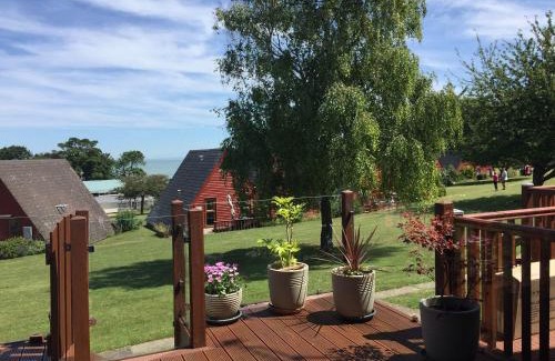 Martin House | Discover Seashell Cottage Lodge 97: Family-Friendly Retreat