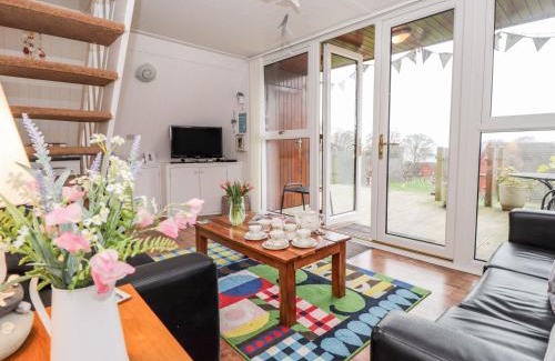Martin House | Discover Seashell Cottage Lodge 97: Family-Friendly Retreat