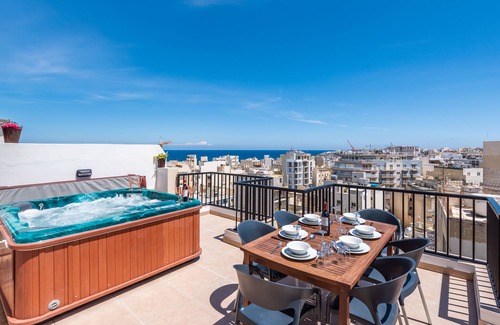 Bugibba Apartment | Stunning Seashells Penthouse with Hot Tub & Ocean View