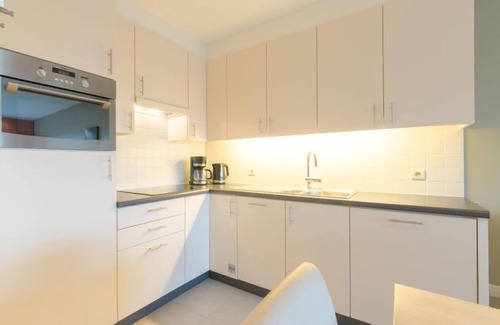 Bredene Apartment | Oceanfront Getaway: Seaside 4.02 by Interhome Awaits