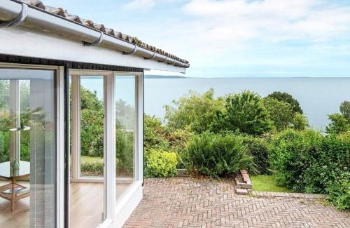 Hvidbjerg Strand House | Cozy 4-Person Holiday Home in B rkop, Pet Friendly Stay