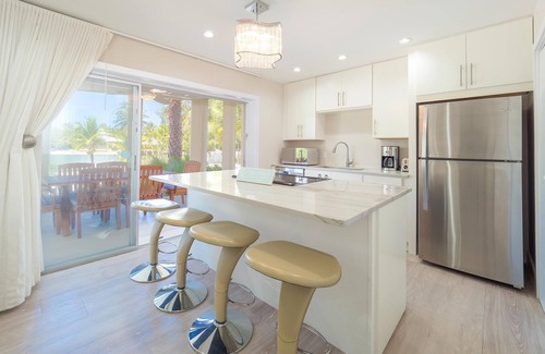 Rum Point House | Seaside Dreams: Contemporary Oasis with Oceanfront Views