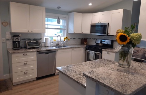 Gloucester House | Beachside Retreat Steps from Good Harbor in Gloucester