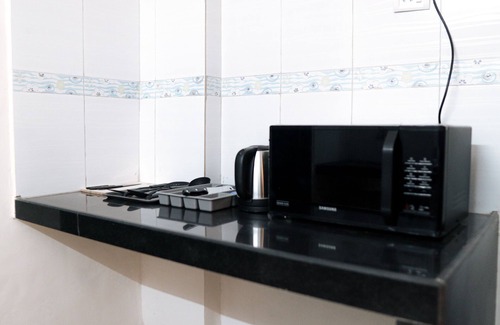 Navi Mumbai Apartment | Cozy Seaside Escape with Fun Party Pad for Families