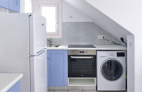 Piso Livadi Apartment | Seaside Ilios Home with Scenic Views Near Logaras Beach