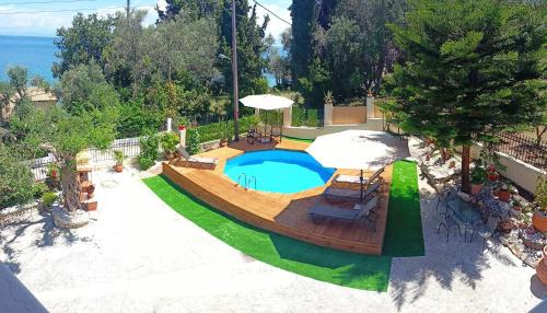 Agia Pelagia Chlomou Apartment | Beautiful Seaside Pool Villa with Oceanfront Views