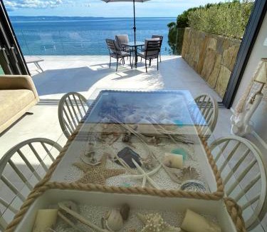 Altipiano Ovest Apartment | Idyllic Seaside Resort with Private Beach & Ocean Views