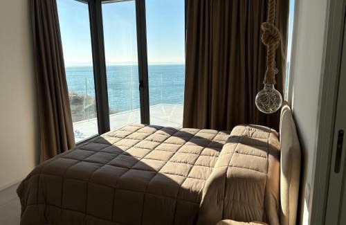 Altipiano Ovest Apartment | Idyllic Seaside Resort with Private Beach & Ocean Views