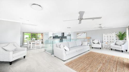 Salamander Bay House | Waterfront Haven: Family-Friendly Home with Heated Pool