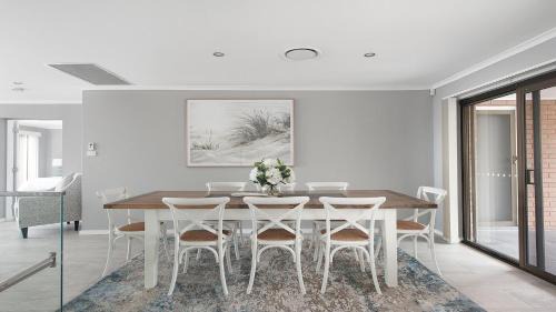 Salamander Bay House | Waterfront Haven: Family-Friendly Home with Heated Pool