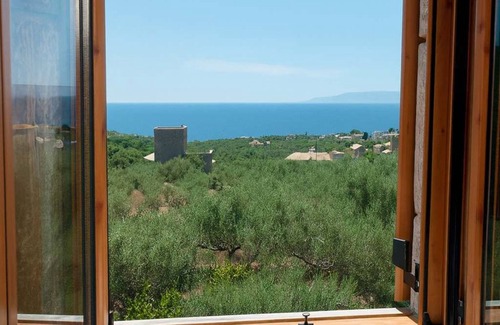 Lefktron Villa | Oceanfront Oasis - Stylish Seaview Home with Breakfast
