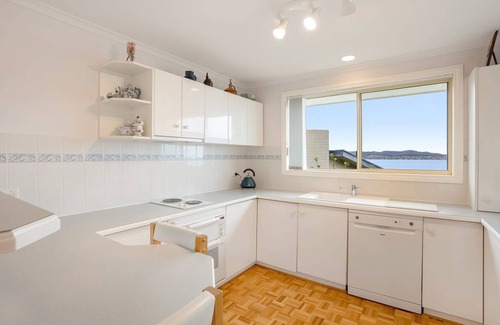 Sandy Bay House | Seaside Serenity: Oceanfront Retreat with Family Amenities