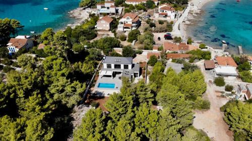 Prizba House | Seaside Villa at Prizba: Oceanfront Bliss with Pool