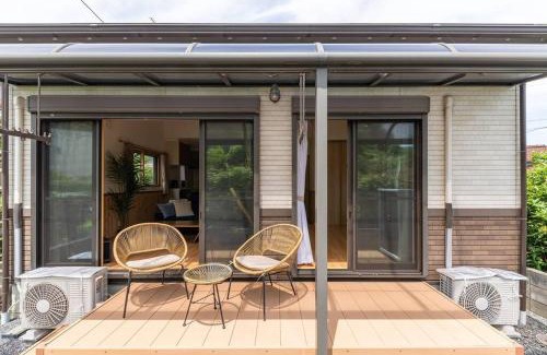 Maizuru Apartment | Beachfront Getaway at Seaside Villa Nagi - Family Friendly
