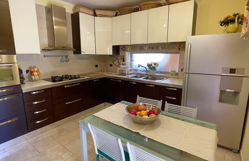 Capoterra Villa | Cozy Seaside Villa with Garden BBQ & Family-Friendly Amenities