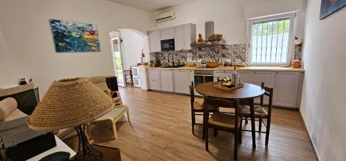 Giorgilorio Villa | Idyllic Seaside Villa with Hot Tub, Steps from the Beach