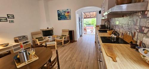 Giorgilorio Villa | Idyllic Seaside Villa with Hot Tub, Steps from the Beach