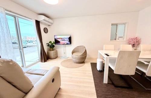 Okinawa House | SeaTime 1-A 新築一軒家空港に近い