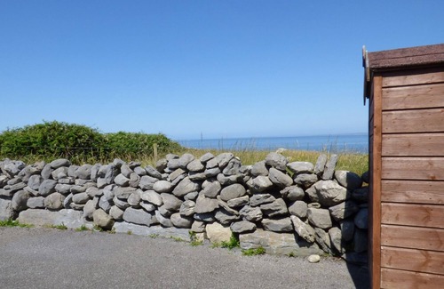 Murroogh House | Seaview Cottage: Pet-Friendly Retreat with Cozy Fire