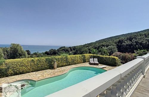 Tomino Hotel | Seaview Villa Marlau: Oceanfront Escape with Pool Access