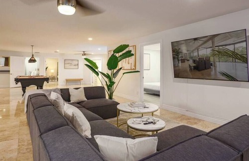 Palm City House | Exclusive Waterfront Retreat with Pool, Dock & Game Room