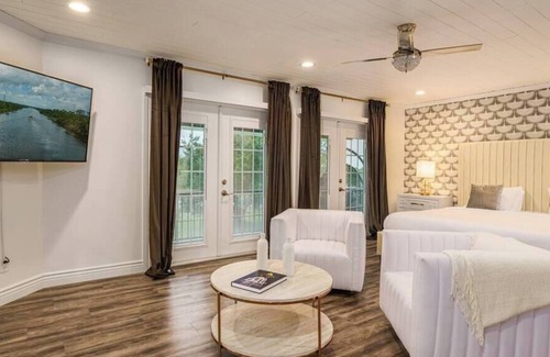 Palm City House | Exclusive Waterfront Retreat with Pool, Dock & Game Room