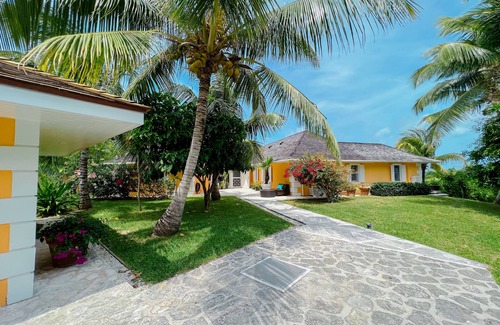 Dunmore Town House | Secluded Beachfront Oasis with Private Access & Ocean Views