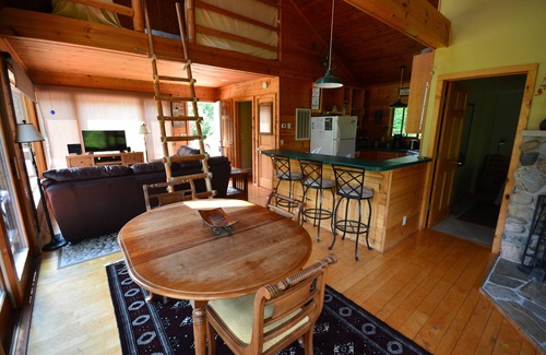 Mayfield House | Private Riverfront Cabin with Hot Tub and Smart TV