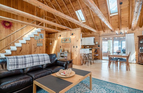 Big Rapids Cottage | Tranquil Lakefront Log Home with Sauna and Scenic Views
