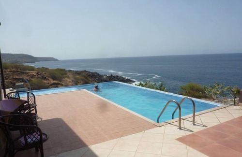 Cidade Velha Villa | Secluded modern villa with pebble beach near Unesco heritage city