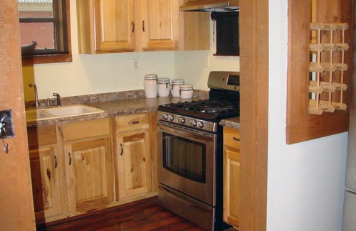 Leakey Cabin | Idyllic Riverfront Cabin with Pool & Spa Amenities