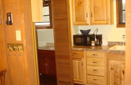 Leakey Cabin | Idyllic Riverfront Cabin with Pool & Spa Amenities