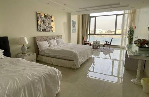 Dhahran Ski Chalet | Discover Secret Beach Resort with Private Ocean View