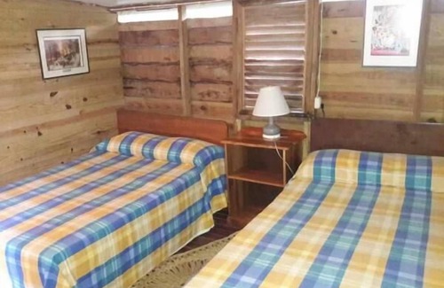 Negril Hotel | Cozy Secret Cabins at Firefly Beach with Breakfast & Dining