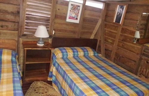 Negril Hotel | Cozy Secret Cabins at Firefly Beach with Breakfast & Dining