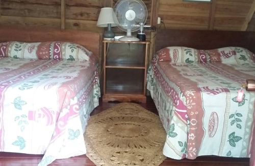 Negril Hotel | Cozy Secret Cabins at Firefly Beach with Breakfast & Dining