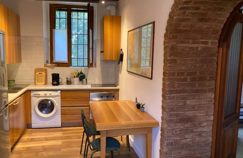Porta Genova Apartment | Secret Garden on Water in the City Center.
