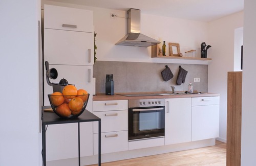 Kahnsdorf Condo | Modern Lakefront Apartment with Loggia - Rated 10/10