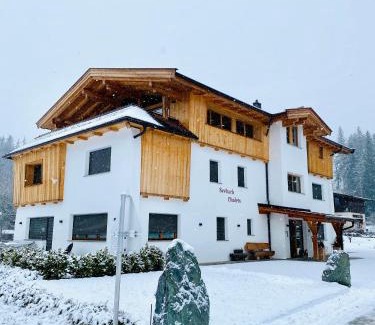 Scheffau am Wilden Kaiser Apartment | Indulgent Seebach Chalets with Hot Tub & Breakfast Included