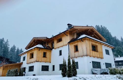 Scheffau am Wilden Kaiser Apartment | Indulgent Seebach Chalets with Hot Tub & Breakfast Included
