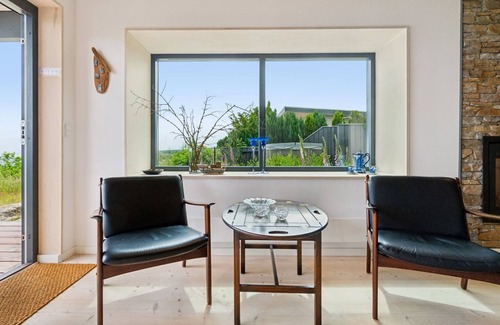 Sandkaas House | Seetje: Oceanfront Retreat with Spa & Hot Tub Amenities