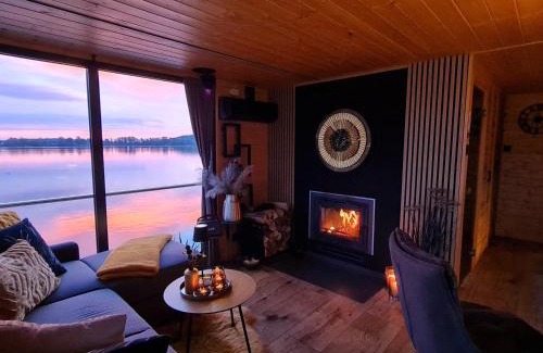 Mullrose Boat Rental | Seaside Houseboat with Fireplace & Sauna - Guest Rated 10/10