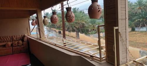 Al Hamra House | Cozy Sehma Guest House with Oceanfront Views & Dining