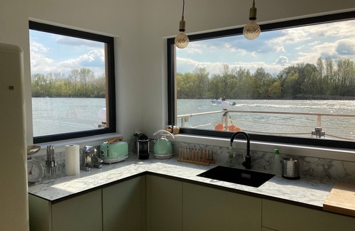 Vaux-sur-Seine Boat Rental | SeineHouse - Enchanting Floating House Experience on Water
