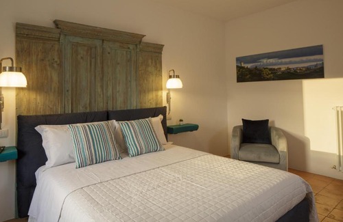 Cannara Apartment | SeiPetali: 4-Star Retreat with Family-Friendly Amenities