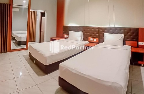 Banjar Hotel | Inviting Selaras Prima Guest House with Pool and Family Fun