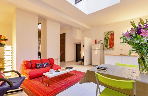 Monti Apartment | Discover Selci: Steps from the Colosseum with Spa Amenities