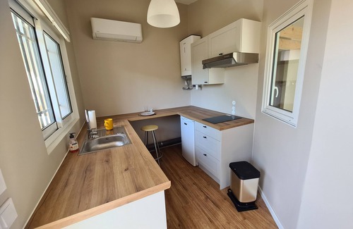 Corneilla-del-Vercol Apartment | Self-contained accommodation with trees, terrace and outdoor area close to the beach.