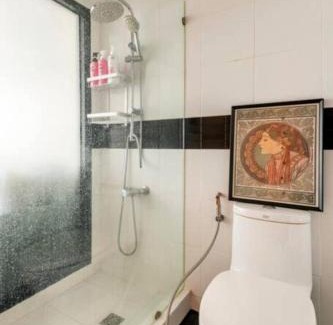 Nana Apartment | Convenient Stay at SelfCheckIn Omni Tower with Pool & Gym