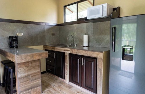 Rio Cuarto de Grecia Apartment | Serene Retreat: Lake Views & Spa Near Rio Cuarto Center